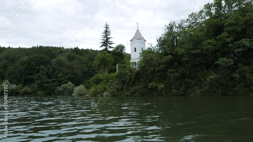 Storage reservoir Velka Domasa, church on the lake, river Ondava, Slovakia photo