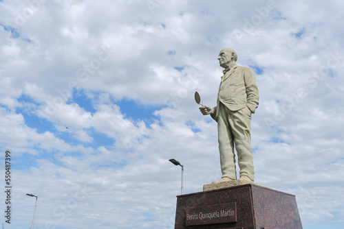 Sculpture of the painter and philanthropist Benito Quinquela Martin in La Boca neighborhood, his back to the Riachuelo, looking towards his house and workshop. photo