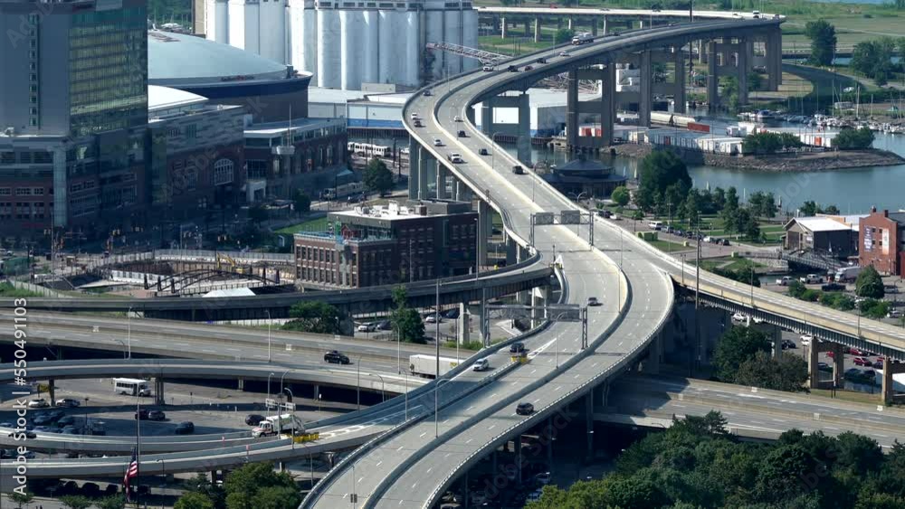 An aerial view of the city of Buffalo, New York and its infrastructure of bridges and buildings beside Lake Erie. An aerial view of the city of Buffalo, New York and its infrastructure of bridges and buildings beside Lake Erie.
