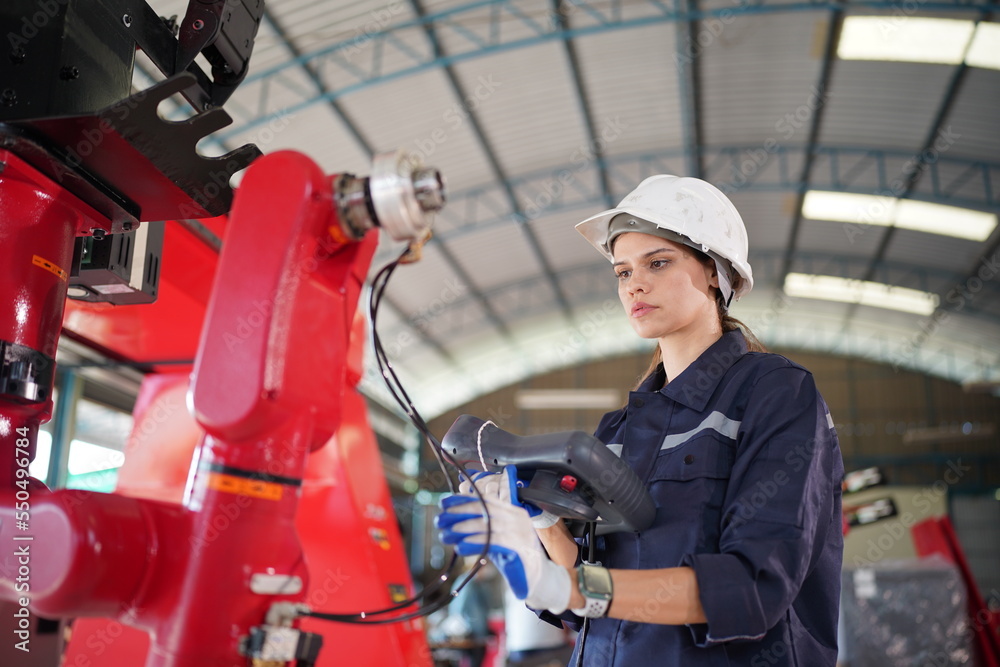 custom made wallpaper toronto digitalRobotics engineer working on maintenance of modern robotic arm in factory warehouse