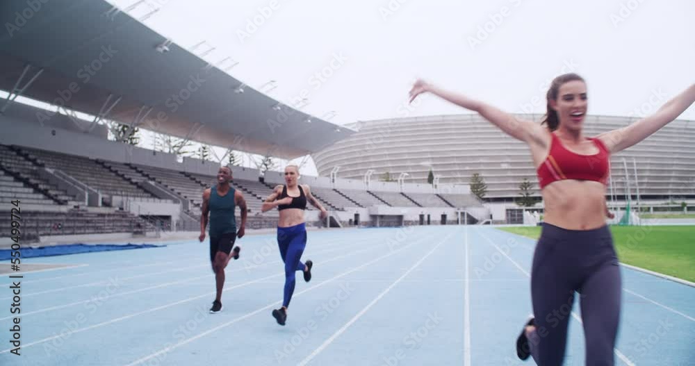 Fitness, people and running competition to the finish line at the stadium for training or cardio workout. Group of athletic runners in competitive sports race for team exercise or practice on track