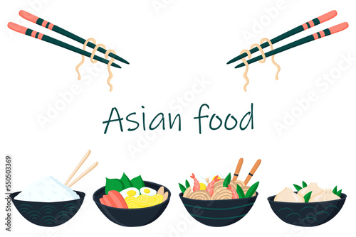 Asian food on plates and wooden chopsticks with noodles