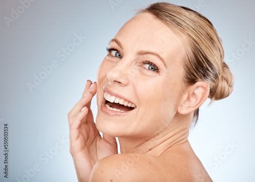 Beauty, skincare and portrait of a happy woman in studio with a smile glow and happiness with cosmetics, makeup and dermatology. Face of aesthetic model with healthy, clean and natural skin