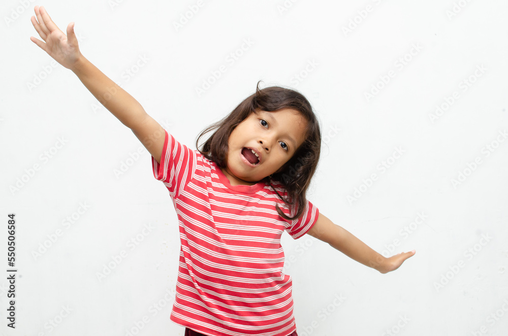happy smilling asian little girl pose cheerfully with happy surprised expression happy smilling asian little girl pose cheerfully with happy surprised expression