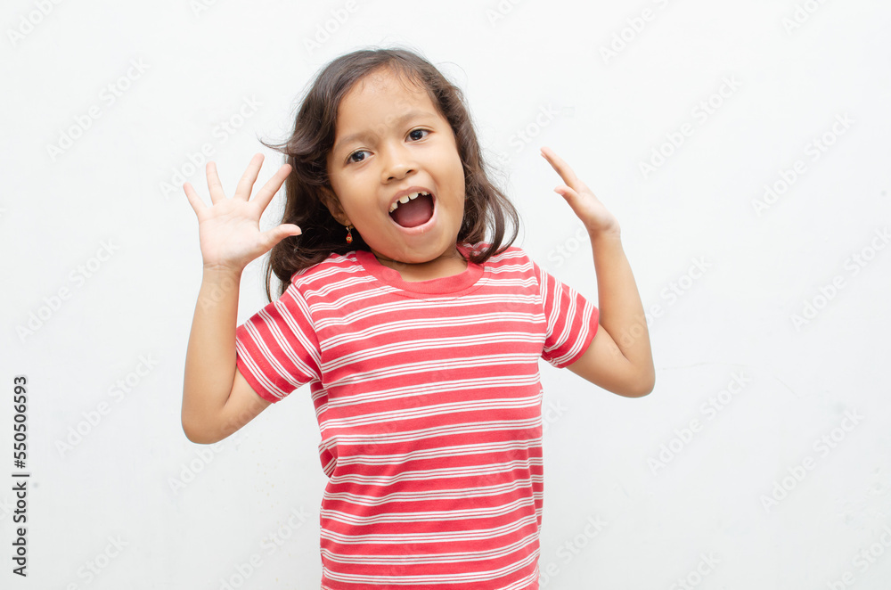 happy smilling asian little girl pose cheerfully with happy surprised expression happy smilling asian little girl pose cheerfully with happy surprised expression