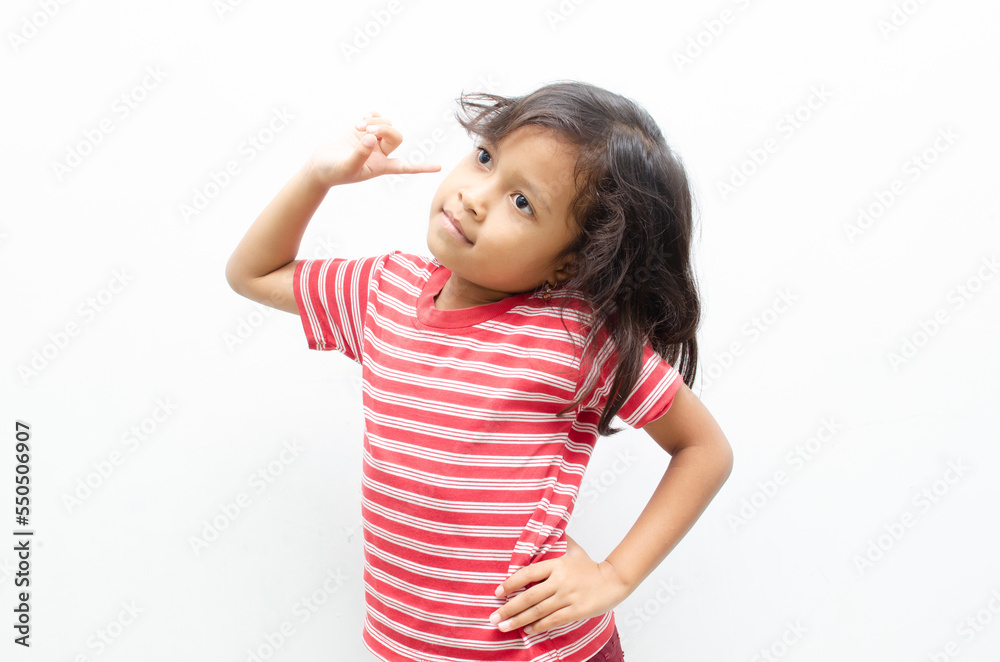 portrait of smilling asian little girl pose thinking gesture with happy expression portrait of smilling asian little girl pose thinking gesture with happy expression