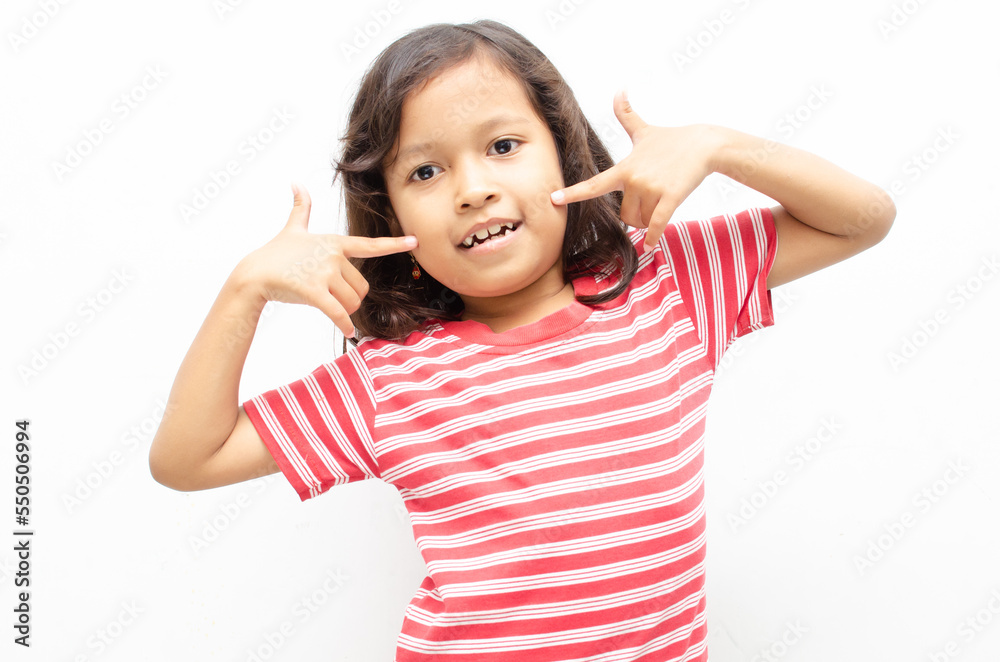 happy smilling asian little girl pose cheerfully with happy surprised expression happy smilling asian little girl pose cheerfully with happy surprised expression