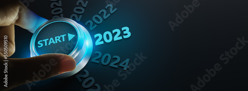 happy new year 2022,Finger about to twist the start button 2023 with the text 2022,2023,2024 and start on twist button.Concept of planning,start,career path,business strategy,opportunity and change