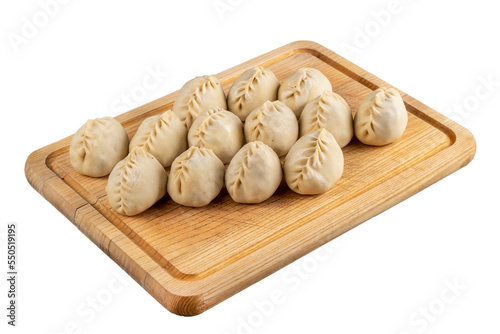 Wallpaper Mural Raw dumplings on a wooden cutting board close-up of a plate. Russian kitchen. Isolated image. Torontodigital.ca