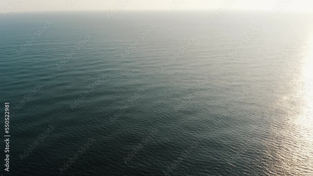 Rippled Ocean Water With Sunlight Reflection In Playa de Monterrico, Guatemala. Aerial Shot Rippled Ocean Water With Sunlight Reflection In Playa de Monterrico, Guatemala. Aerial Shot