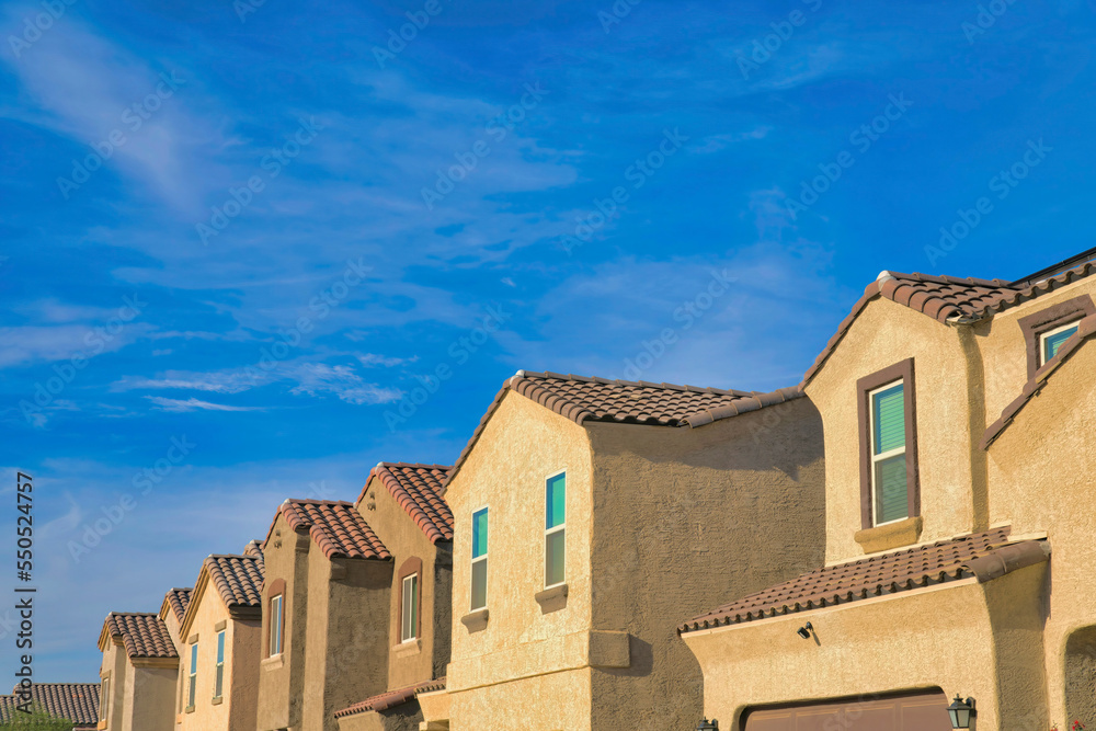 Side view of houses in a suburbs neighborhood at Tucson, Arizona Side view of houses in a suburbs neighborhood at Tucson, Arizona