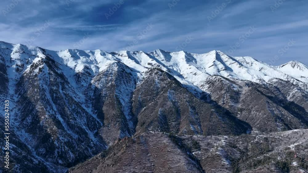 Aerial Mount Nebo summit Utah snow. Beautiful season winter snow on Wasatch mountain forest. Mount Nebo, Central Utah. Canyon valley and trails. Travel destination. Aerial Mount Nebo summit Utah snow. Beautiful season winter snow on Wasatch mountain forest. Mount Nebo, Central Utah. Canyon valley and trails. Travel destination.