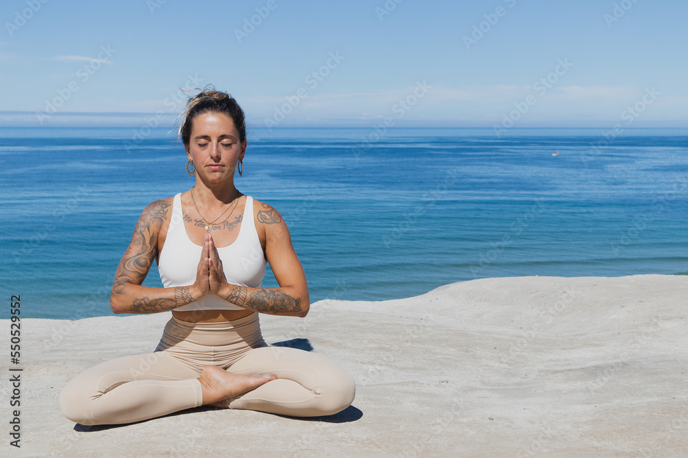 prayer hands Anjali Mudra yoga on the beach meditation