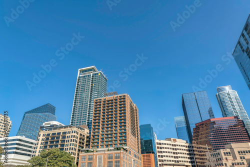 Austin, Texas- Cityscape in a low angle view against the blue sky background