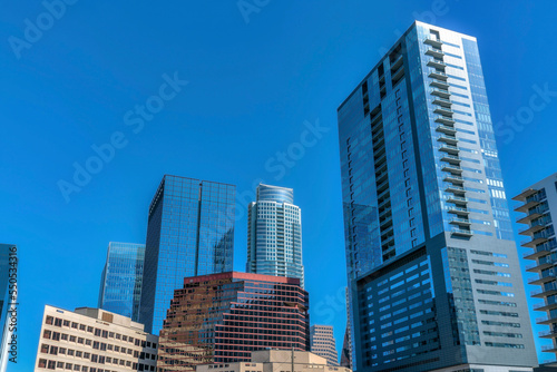 Austin, Texas- Cityscape with modern high-rise buildings with a reflection of blue sky