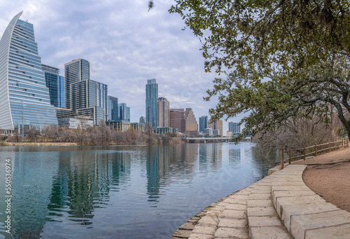 Cityscape view from the shore of Colorado River at Auditorium Shores Park- Austin, Texas photo