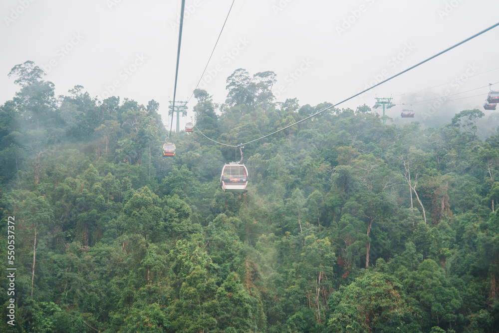 View of Ba Na Hills Mountain in the fog from Cable car. Landmark and popular. Da Nang, Vietnam and Southeast Asia travel concept