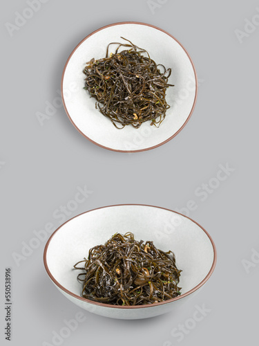 Wallpaper Mural Seaweed salad in a plate from different angles on a gray background. Diet and healthy food for menu Torontodigital.ca