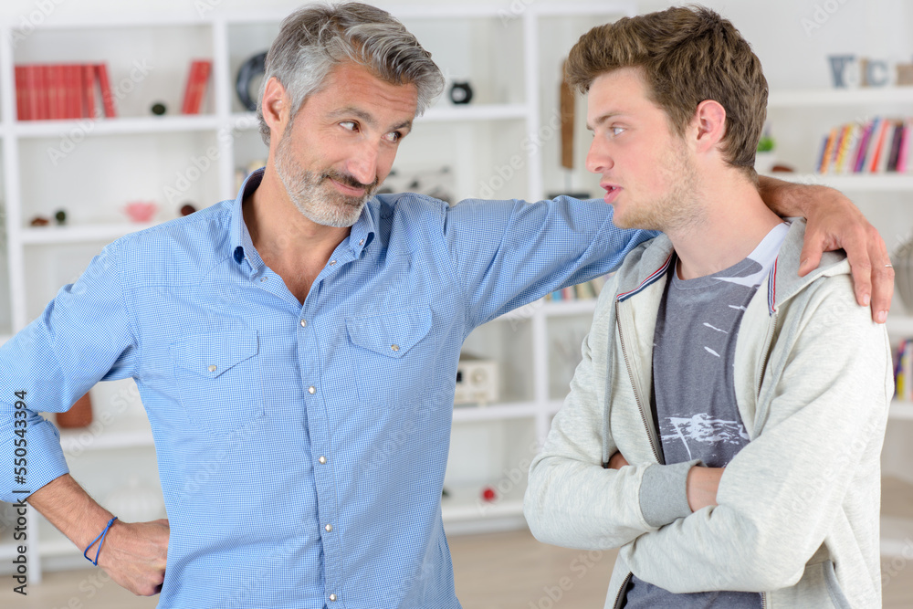 Fototapeta premium father and son during a conversation