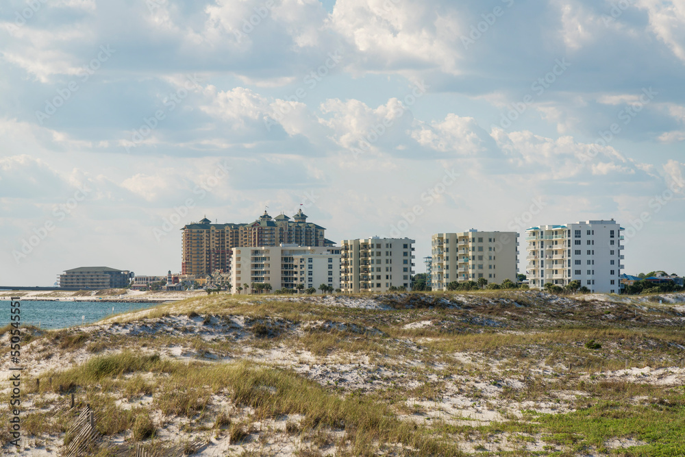 Destin, Florida- Views of multi-storey condos and large hotel building at the beach