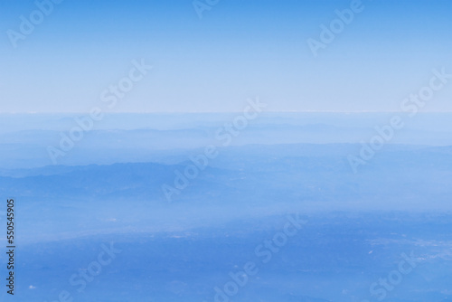 Flying over the clouds, from the airplane window