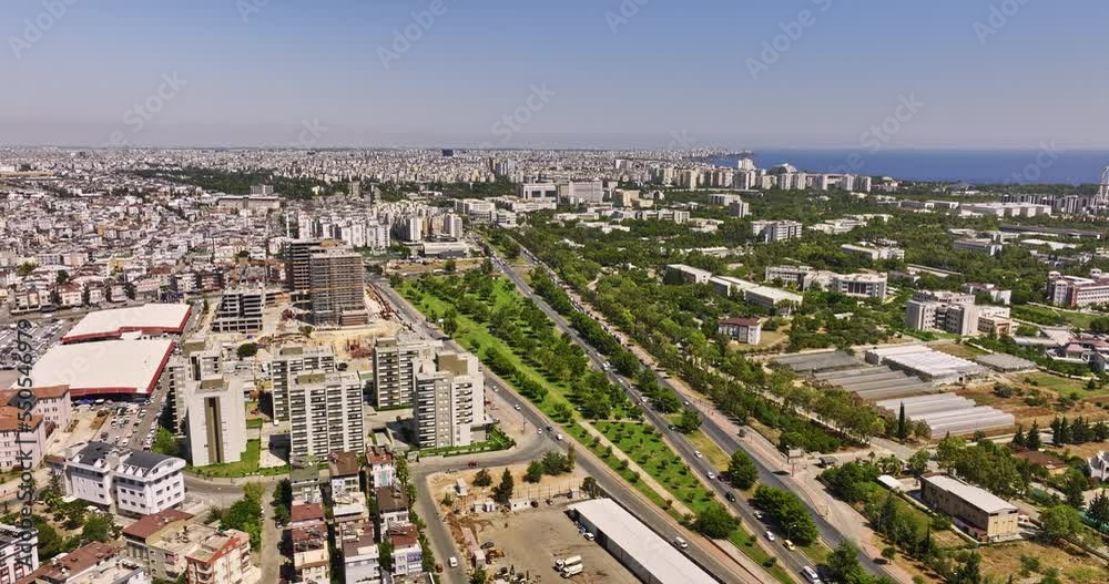 Antalya Turkey Aerial v41 drone flyover across gülveren and pinarbasi neighborhoods capturing cityscape with urban plantation and akdeniz university campus area - Shot with Mavic 3 Cine - July 2022 Antalya Turkey Aerial v41 drone flyover across gülveren and pinarbasi neighborhoods capturing cityscape with urban plantation and akdeniz university campus area - Shot with Mavic 3 Cine - July 2022