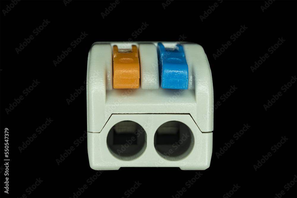 Compact splicing connector isolated on black background. Compact splicing connector isolated on black background.