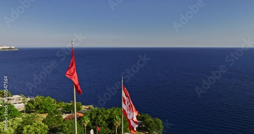 Antalya Turkey Aerial v14 panoramic view fly around flags of turkish national and antalyaspor football club capturing coastal beach and surrounding neighborhoods - Shot with Mavic 3 Cine - July 2022 photo