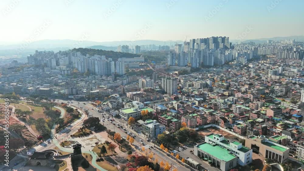 Suwon: Aerial view of city in South Korea in autumn colors, clear blue sky - landscape panorama of Eastern Asia from above