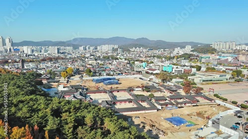 Wallpaper Mural Suwon: Aerial view of city in South Korea, fortress Hwaseong Haenggung, clear blue sky - landscape panorama of Eastern Asia from above
 Torontodigital.ca