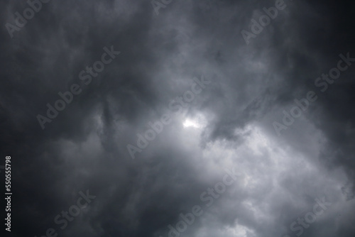 Dark ominous grey storm clouds. Dramatic sky in nature