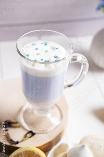 Decorated Thai blue Anchan tea with whipped vegetable milk
