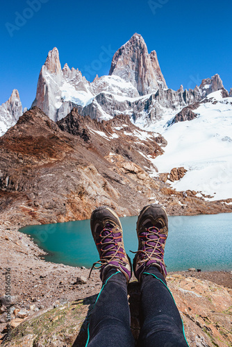 Hiking boots at Laguna de los tres and fitz roy in el chalten patagonia argentina photo