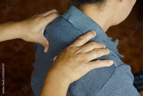 Fotografija Closeup hands massage woman's shoulders
