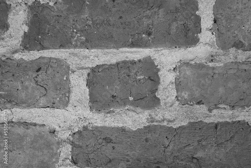 A gray background of a brick wall. Brick texture, pattern.