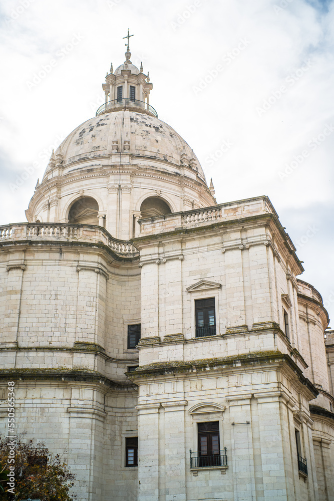 historic buildings of the old town of lisbon. Old colorful buildings, narrow streets, historic churches. Cloudy day