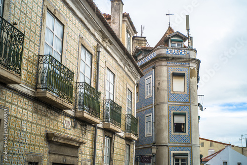 historic buildings of the old town of lisbon. Old colorful buildings, narrow streets, historic churches. Cloudy day
