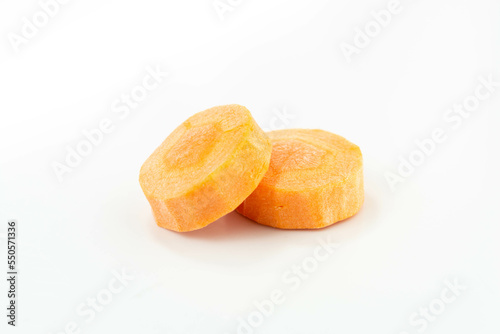 raw carrot slices isolated on white background