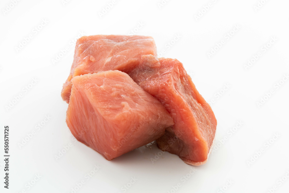 fresh raw meat cubes isolated on a white bacground fresh raw meat cubes isolated on a white bacground