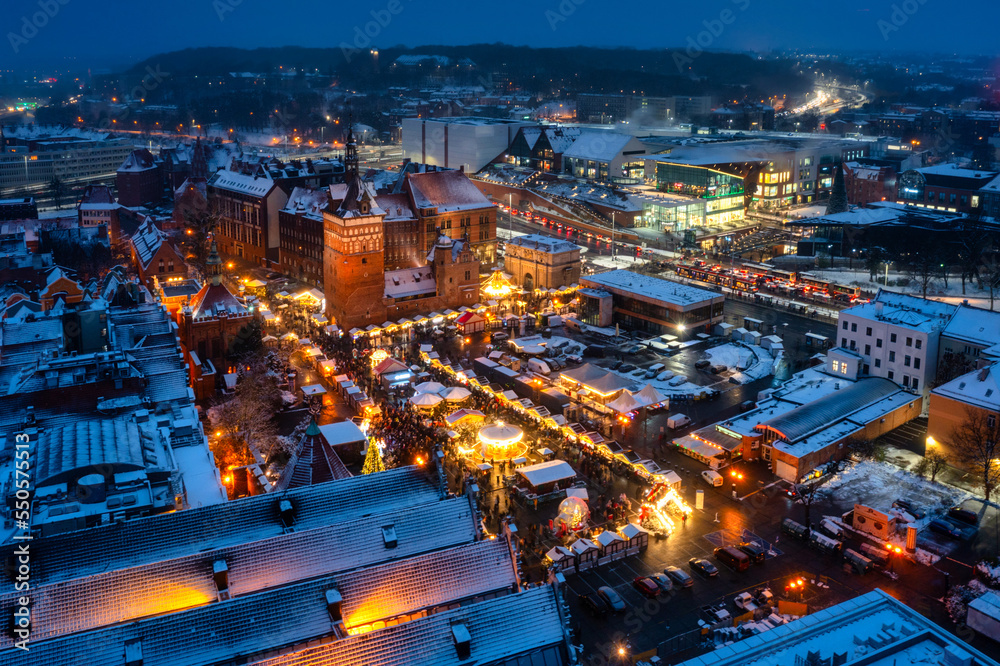 Beautifully lit Christmas fair in the Main City of Gdansk at dusk. Poland