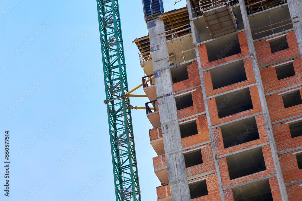 Construction high crane,building and blue cloud sky Construction high crane,building and blue cloud sky