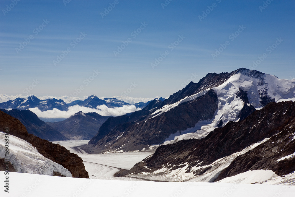 The Jungfraufirn glacier in the foreground, Konkordiaplatz and the Aletsch Glacier beyond: Bernese Alps, Switzerland