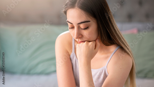 Sad tired young woman having or depression