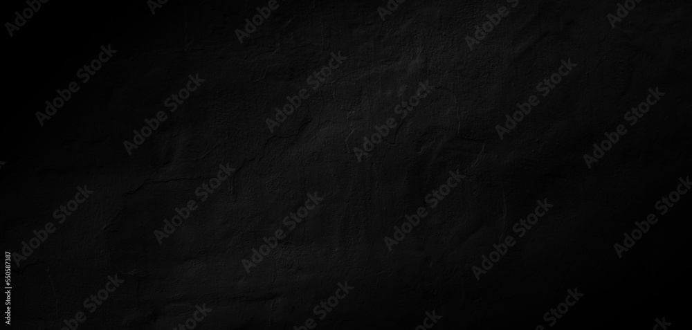 Dark black wide wall background texture with spotlight