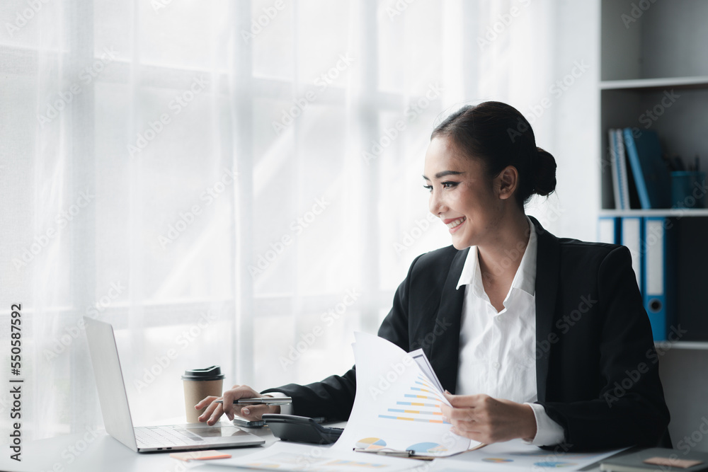 Beautiful Asian woman is a businesswoman who leads a new generation of startups, a woman who runs and manages a business plan to build confidence and stability in business, woman-led business concept. Beautiful Asian woman is a businesswoman who leads a new generation of startups, a woman who runs and manages a business plan to build confidence and stability in business, woman-led business concept.
