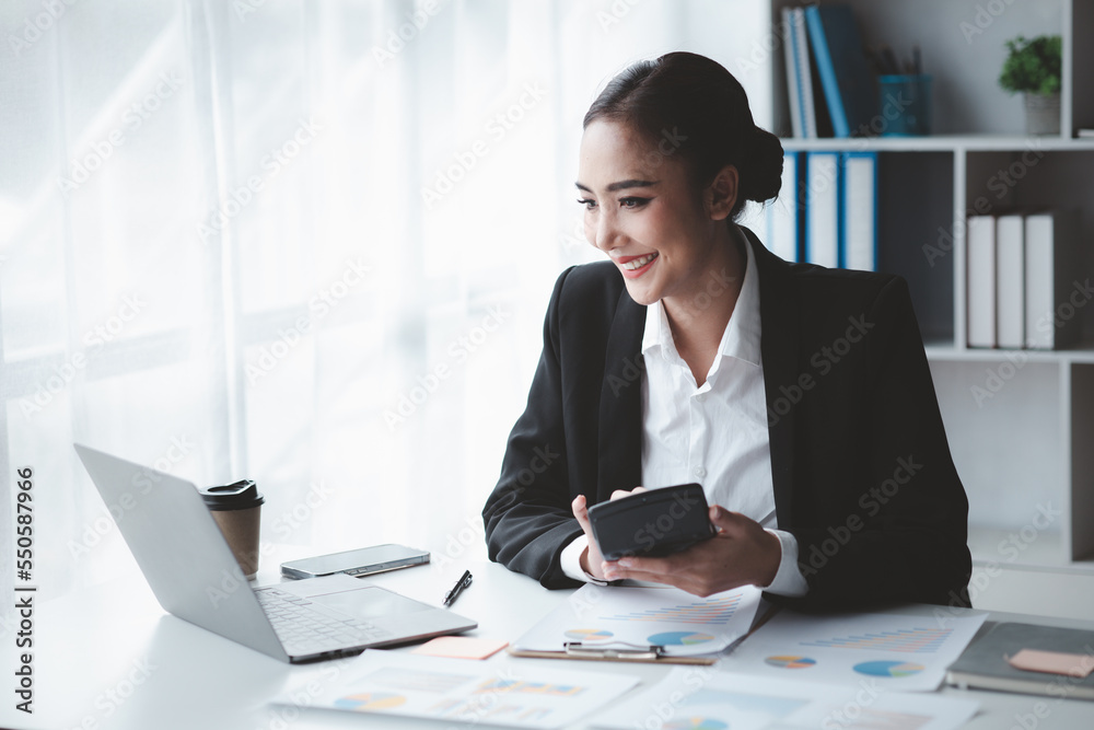 Beautiful Asian woman is a businesswoman who leads a new generation of startups, a woman who runs and manages a business plan to build confidence and stability in business, woman-led business concept. Beautiful Asian woman is a businesswoman who leads a new generation of startups, a woman who runs and manages a business plan to build confidence and stability in business, woman-led business concept.