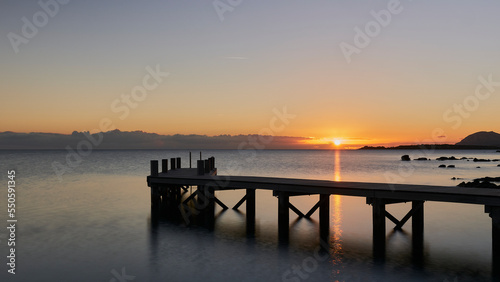 A picture of jetty at sunrise