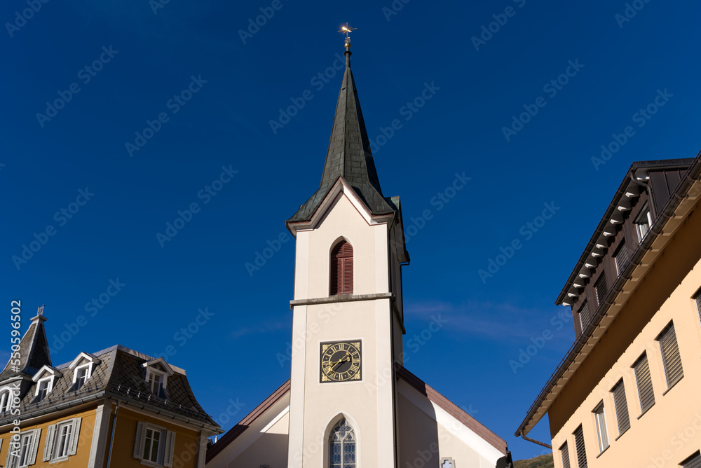 Mountain village Realp, Canton Uri, with catholic church on a late summer day. Photo taken September 12th, 2022, Realp, Switzerland.