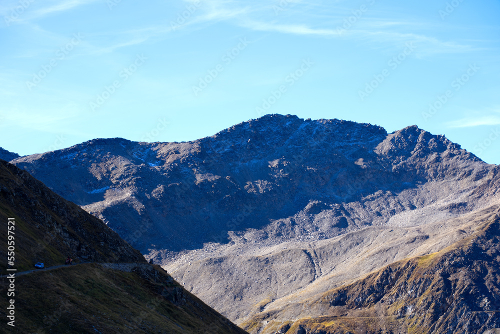 Scenic view of mountain panorama at famous Swiss mountain pass Furkapass with rocks and mountain peak on a sunny late summer day. Photo taken September 12th, 2022, Furka Pass, Switzerland.