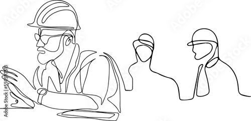 Construction manager and engineer working on building site